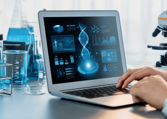 Scientist analyzing DNA data on laptop in laboratory – pioneering medical technology for research, screening, and diagnostics in Singapore and ASEAN